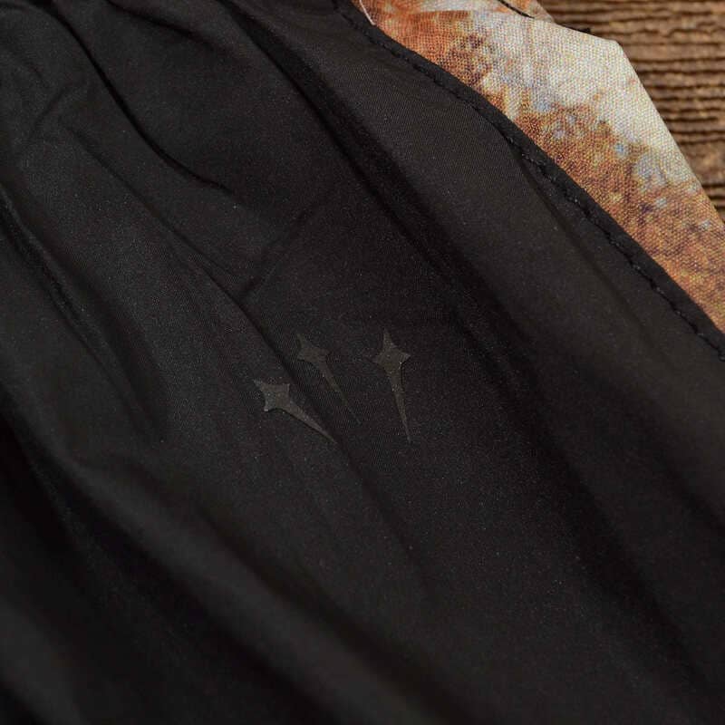 Conjunto Nike x NOCTA Running Camo